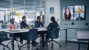 Employees having a satellite meeting