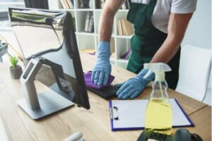 A man cleaning a meeting room