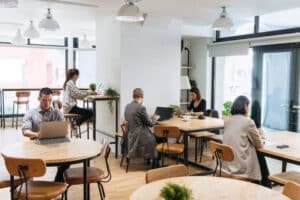 People working independently at hot desking