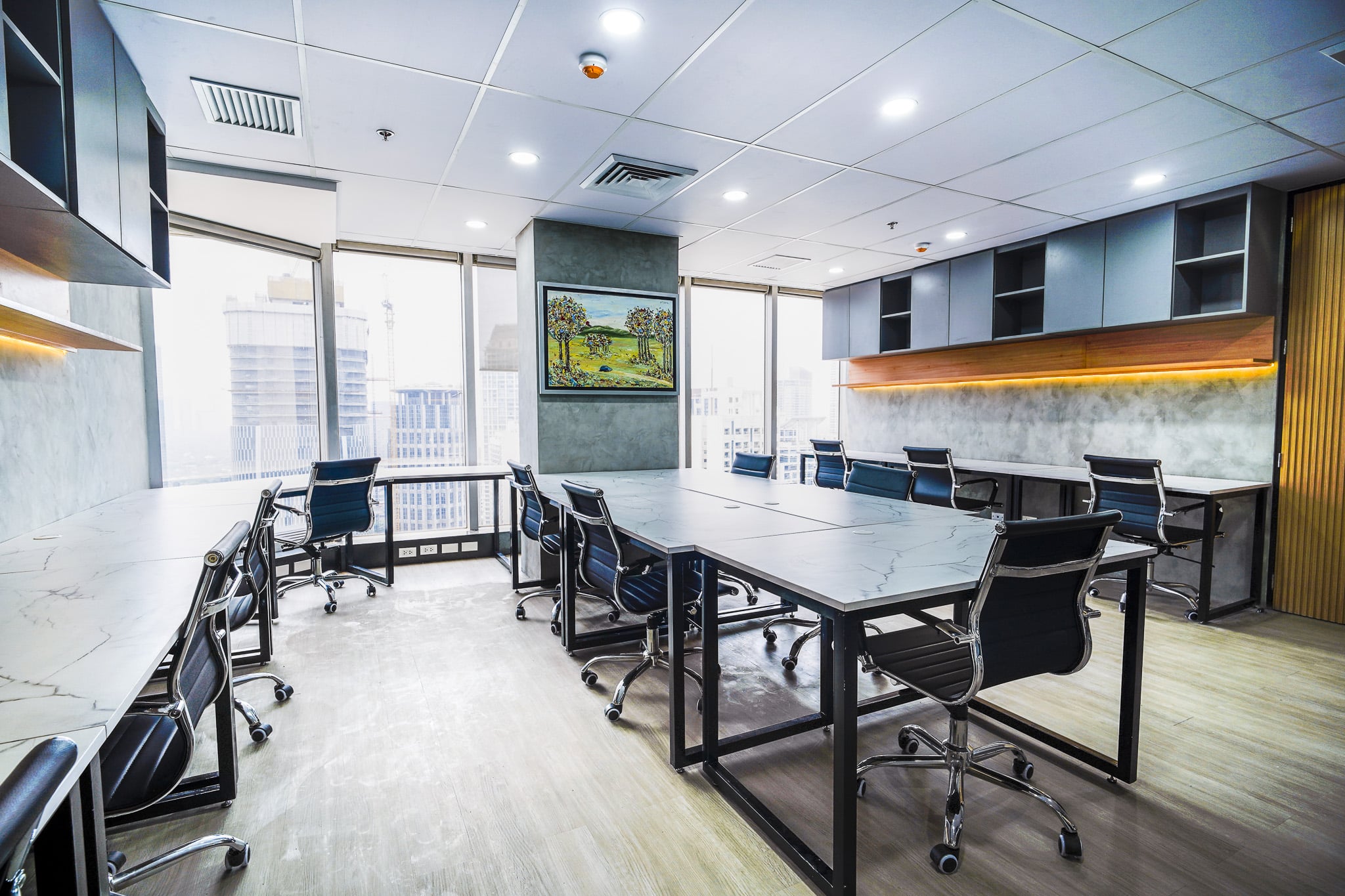 Spacious coworking office with shared desks and city views