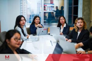 Business team collaborating in an M Spaces meeting room